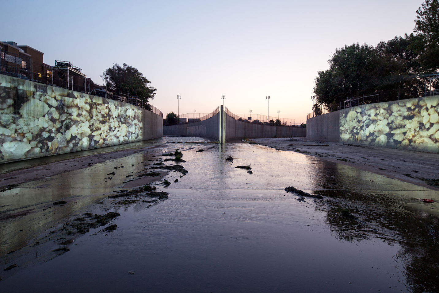 UnderLA 2016 
Refik Anadol and Peggy Weil  
Video Projection - Los Angeles Aquifer projected onto the banks of the Los Angeles River. Commissioned by the City of Los Angeles for CURRENT:LA WATER, Origin of LA River, Canoga Park, LA  Photo: Panic Studio LA, courtesy of City of Los Angeles